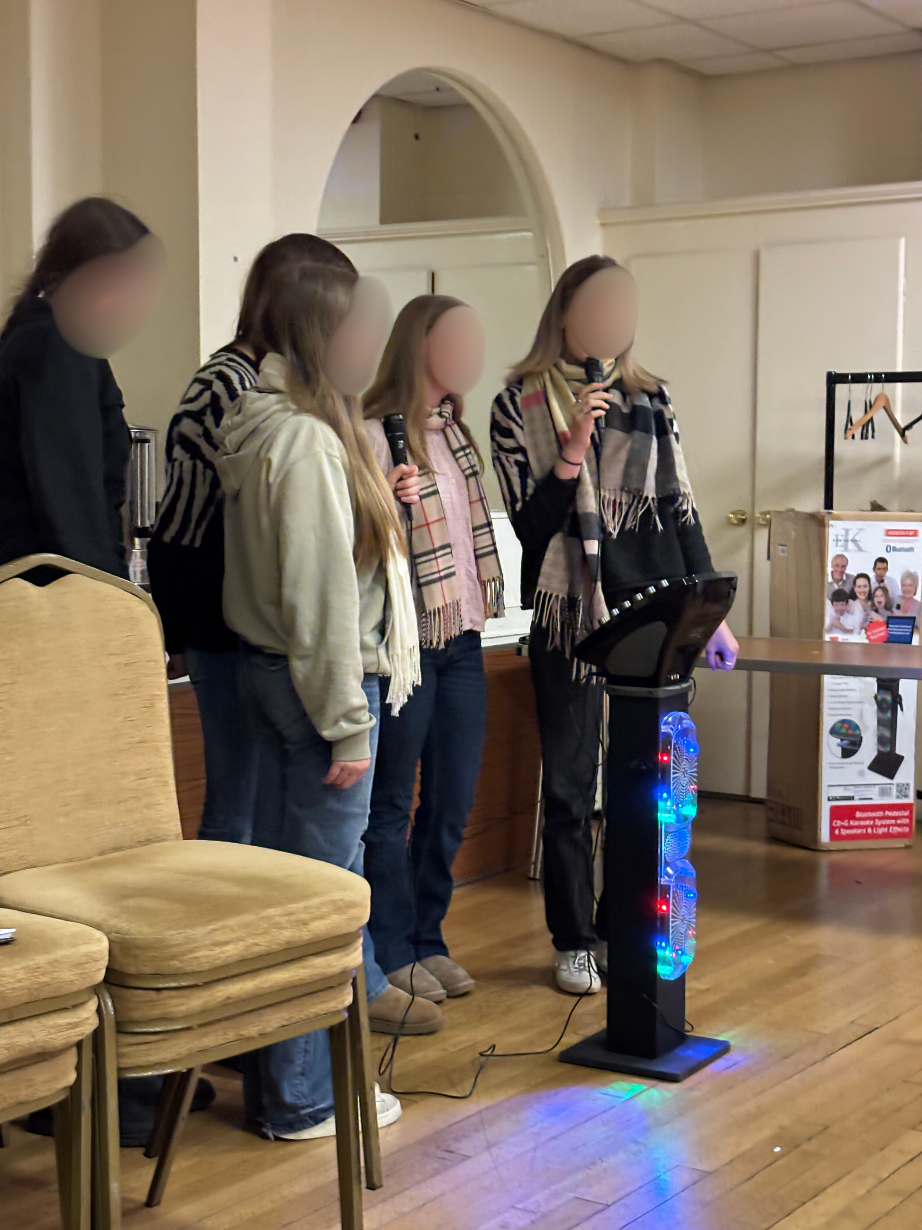 Group of students singing karaoke